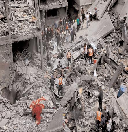 Israeli strike on Gaza apartment building kills at least 23, say officials