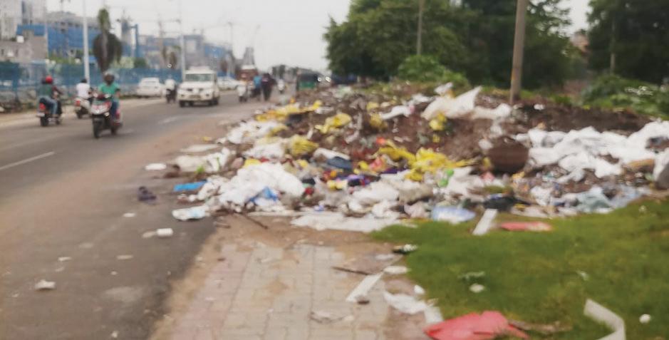 Failure of door-to-door waste collection forces residents to dump garbage on roadsides