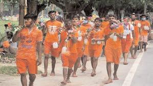 UP CM reviews preparations, Delhi CM warns against disturbing Kanwar Yatra; people throng across temples