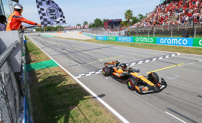 Piastri leads McLaren Spain win