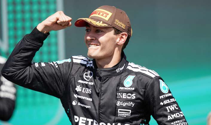 Russell triumphs in Canada