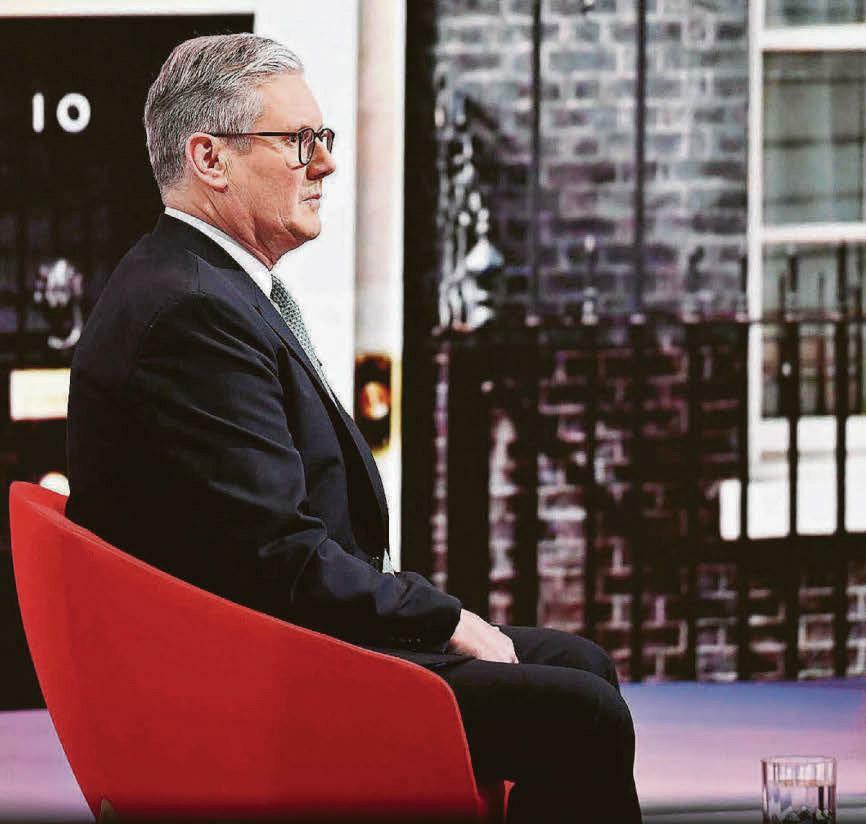 PM DEFENDS SLASHING AID