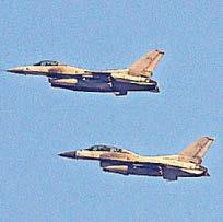 15 injured as jets bomb a housing area accidentally