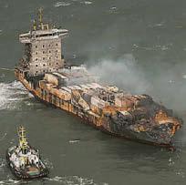 Fires put out on crash ship amid plastics spill clean-up