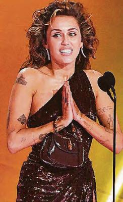 Miley: Grammy win helped heal broken heart