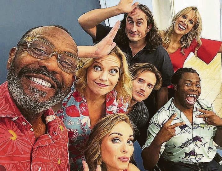 Celebs swim with sharks