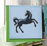 Car compo dents Lloyds' earnings