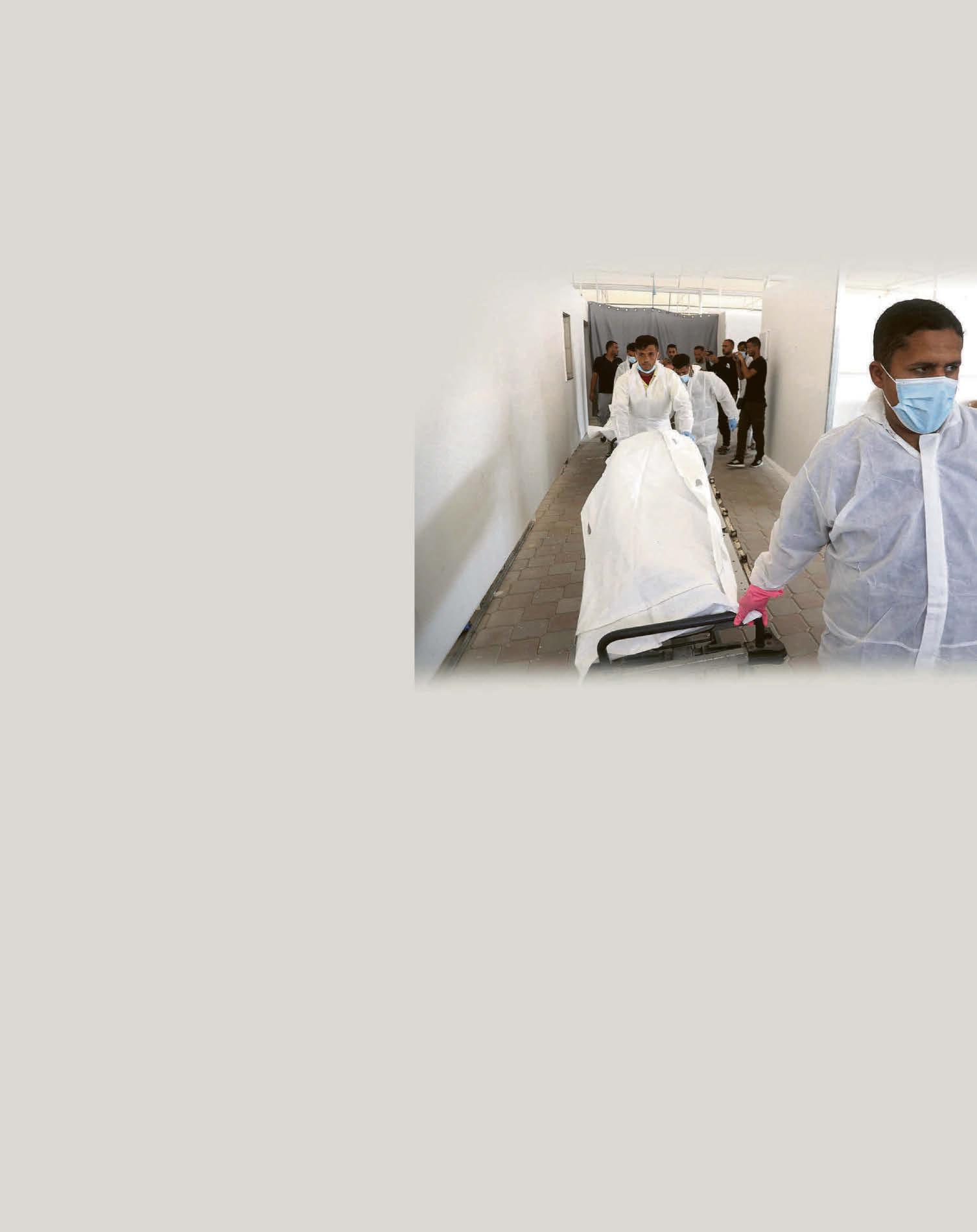 GRIM EXCHANGE OF REMAINS IN GAZA