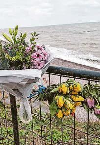 Body found in hunt for 2 missing swimmers