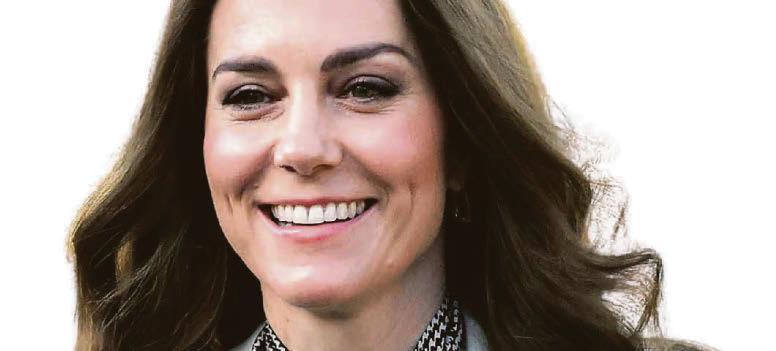 Kate's caught red-handed by children at hospice visit