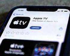 Apple buoyed by TV and music as iPhone sales fall