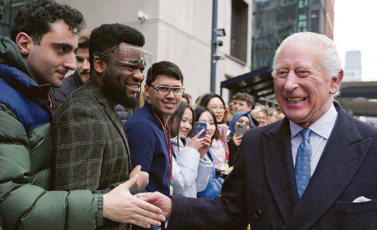 Hero's welcome for the King at centre for war wounded