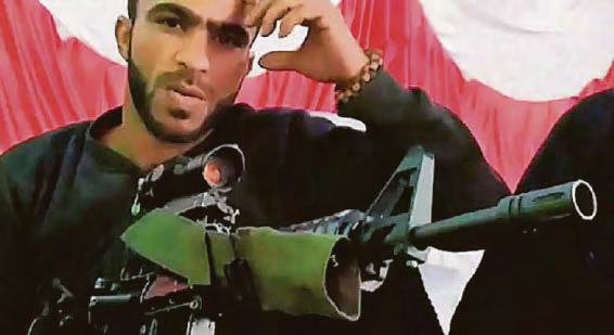 Gun-toting Palestinian militant charged with immigration offences