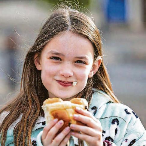 Baker's dozens show up for hot cross bun