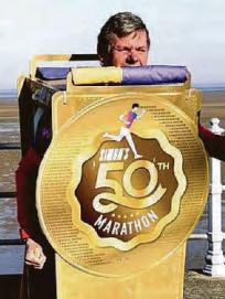 Marathon ace brings own medal