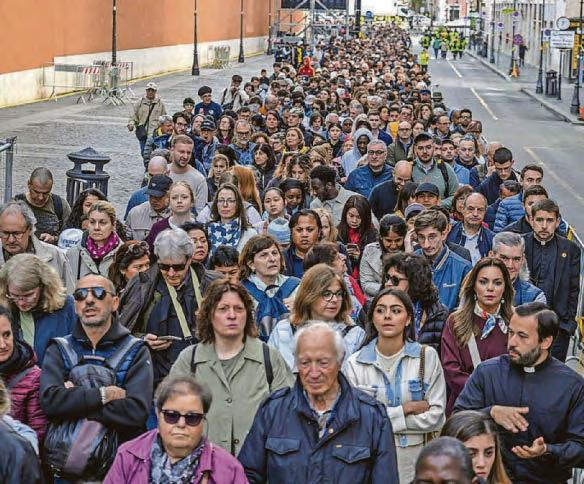 Patiently they queue in their thousands to pay respects to the pontiff