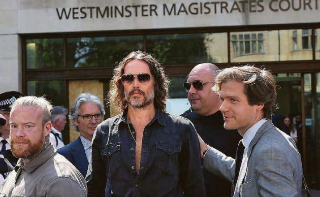 Brand 'raped woman visitor to Labour rally', court is told