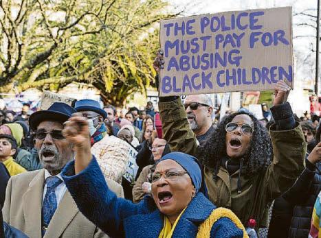 Two officers fired over strip search of black schoolgirl