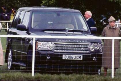 BATTLE ROYAL AS LATE QUEEN'S RANGE ROVER GOES UNDER HAMMER FOR RECORD £156,000