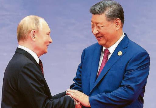 Putin among leaders of 24 nations at bloc's major China summit