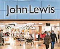 John Lewis blames higher taxes as it swings into red