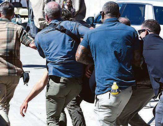Manhunt for Kirk assassin tracks escape from rooftop sniper's nest as murder weapon found