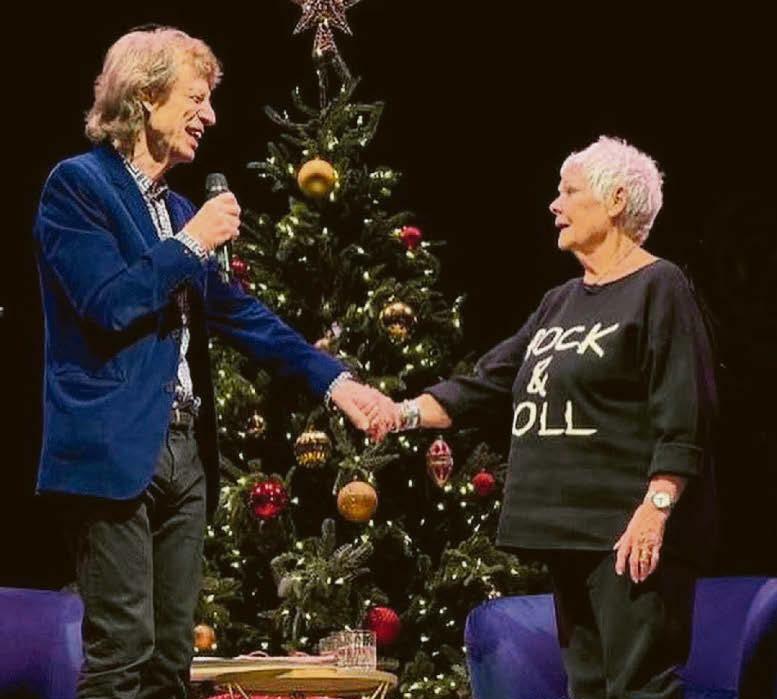 Stone me! Jagger stuns Dame Judi