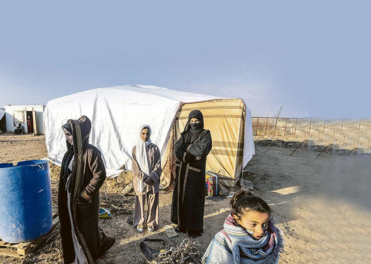 Syrians stay in camps a year after liberation
