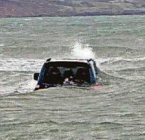 Car washed into sea at beauty spot
