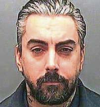 Paedophile rocker 'killed in row over protection money'