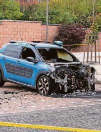 Two facing court over fire in prison car park