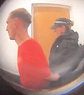 Peephole video shows killer's arrest