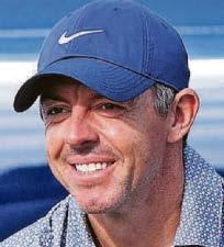 Rory slips but helps pal to the Dubai lead