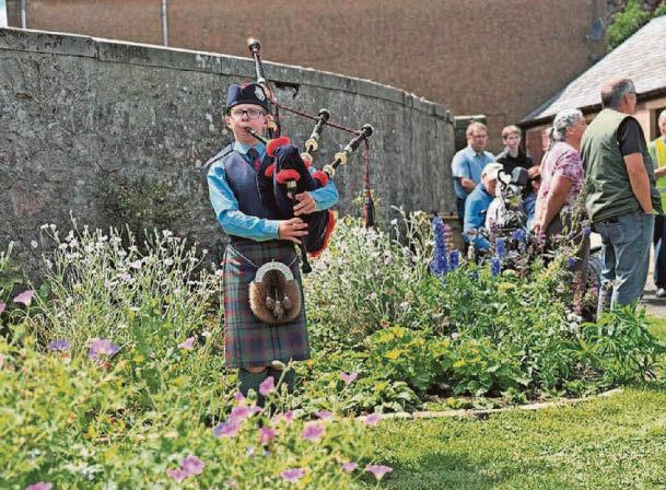 Community garden blooms with official opening celebrations