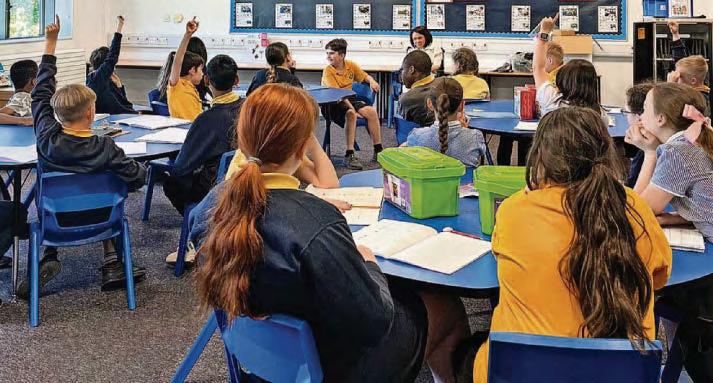 Pam is a class act on visit to primary school