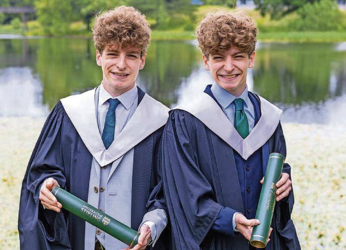 Seeing double as two sets of twins graduate together