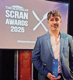 Teen distiller is awarded employee prize