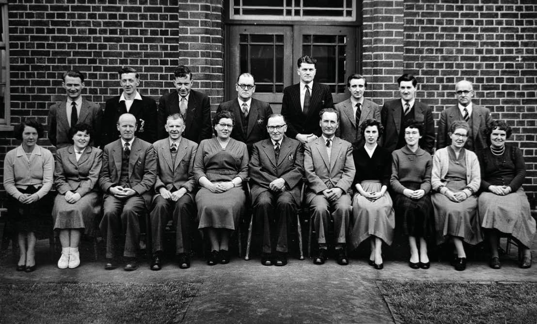 Secondary School staff take time out of class to pose for pictures