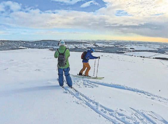 Skiers take to snowy slopes