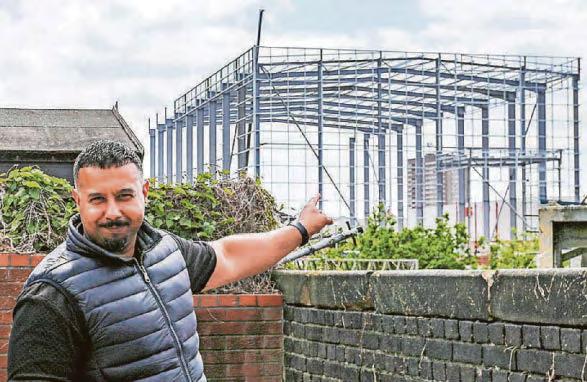 Neighbours furious as store's 'giant fridge' dwarves homes