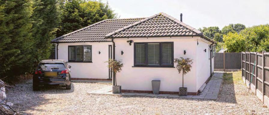 Man forced to tear down bungalow in ex's garden