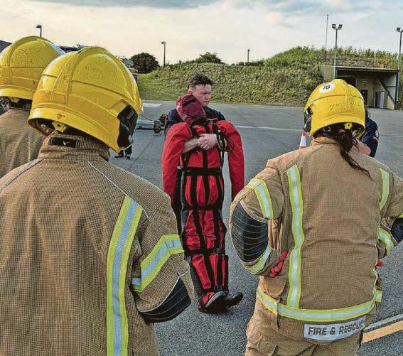Burning desire ... Feeling the heat on training day with firefighters