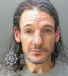 Burglar who assaulted two police officers is jailed