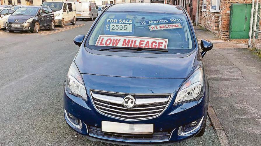 Trader fined over cars for sale on a public highway