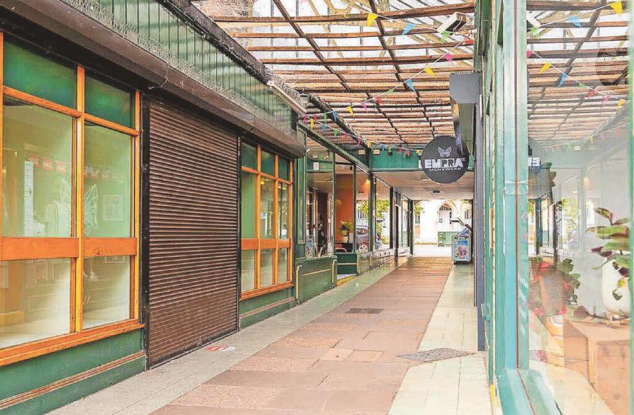 Town centre shopping arcade and flats on market for £1.5m