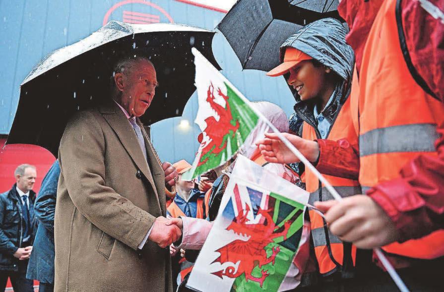 King Charles pays a rainy birthday visit to South Wales