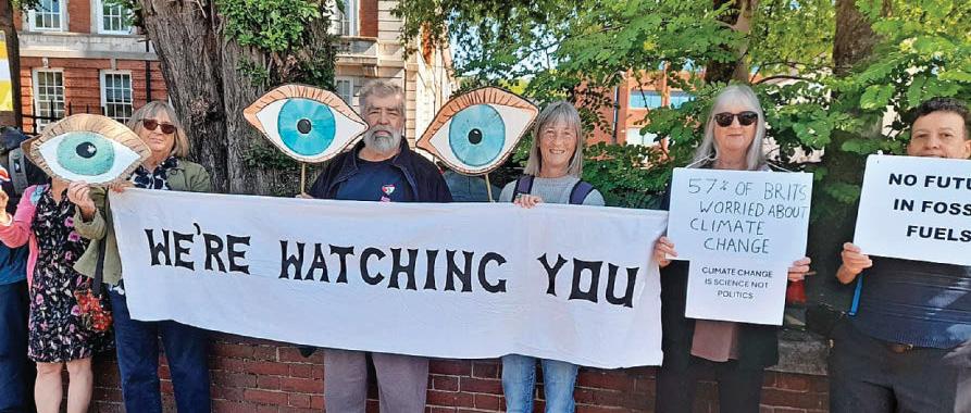 Leader promises to 'break the mould' as protest marks the party's first meeting