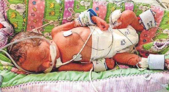 'I was surrounded by other mothers holding their babies, I didn’t even know where mine was'