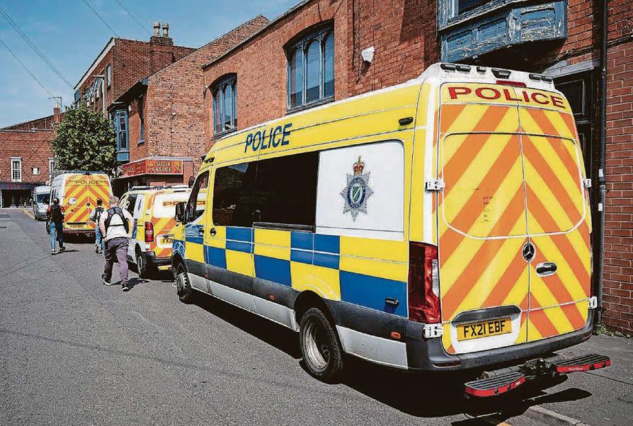 Four arrested after raids on barber and vape shops