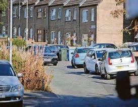 Clear road ahead on estate full of cars